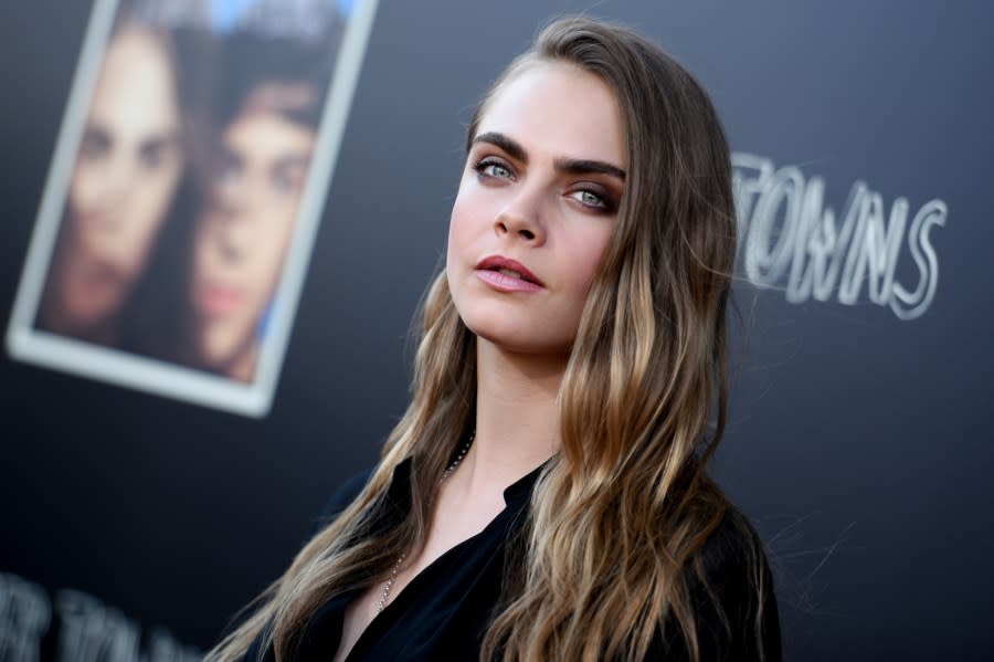 Cara Delevingne arrives at "Paper Towns" and live concert event held at YouTube Space LA on Friday, July 17, 2015 in Los Angeles. (Photo by Richard Shotwell/Invision/AP)