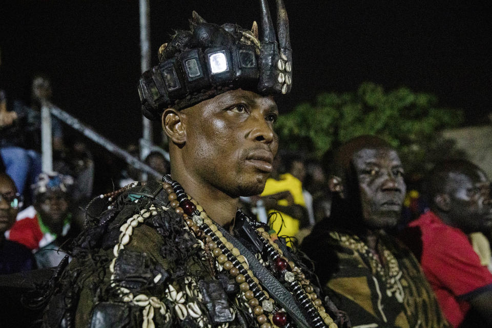 Dozos, ancient hunters who have been drawn into the Islamic extremist fight, participate in a celebration of their culture in Bobo-Dioulasso, Burkina Faso, 360 kilometers (220 miles) west of the capital, Ouagadougou, on Sunday, March 28, 2021. “Before someone faces a challenge, they know there are supernatural powers and spirits they can call upon in any situation,” said Jean Celestin Ky, professor of history at Joseph Ki-Zerbo University in Ouagadougou. (AP Photo/Sophie Garcia)