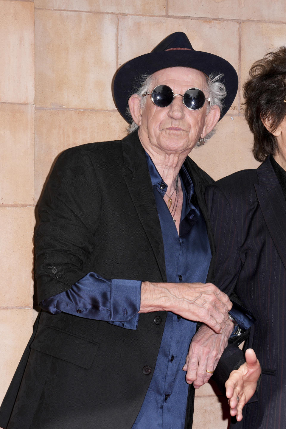 Keith Richards poses for photographers upon arrival at the Rolling Stones Hackney Diamonds launch event on Wednesday, Sept. 6, 2023 in London. (Scott Garfitt/Invision/AP)