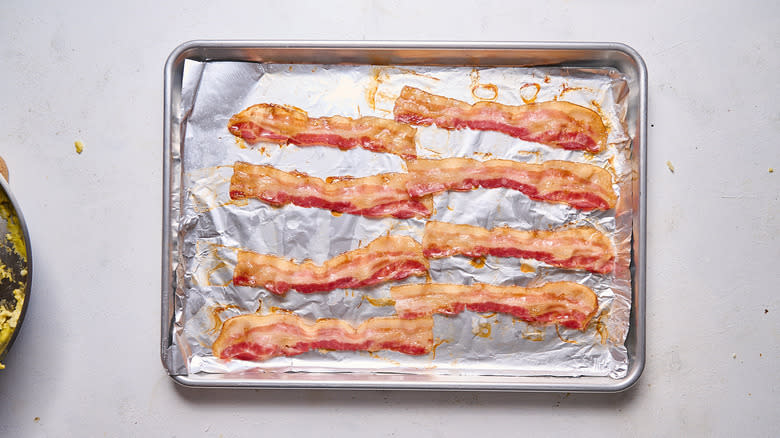 cooked bacon on sheet tray