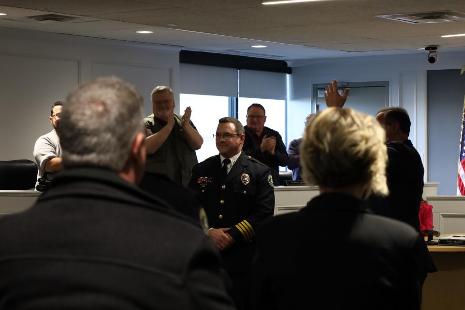 Southaven Police Chief Brent Vickers is congratulated on his appointment by the crowd and board of alderman Tuesday, Jan. 30. Nearly 100 people, mostly officers, came to witness Vickers' appointment.