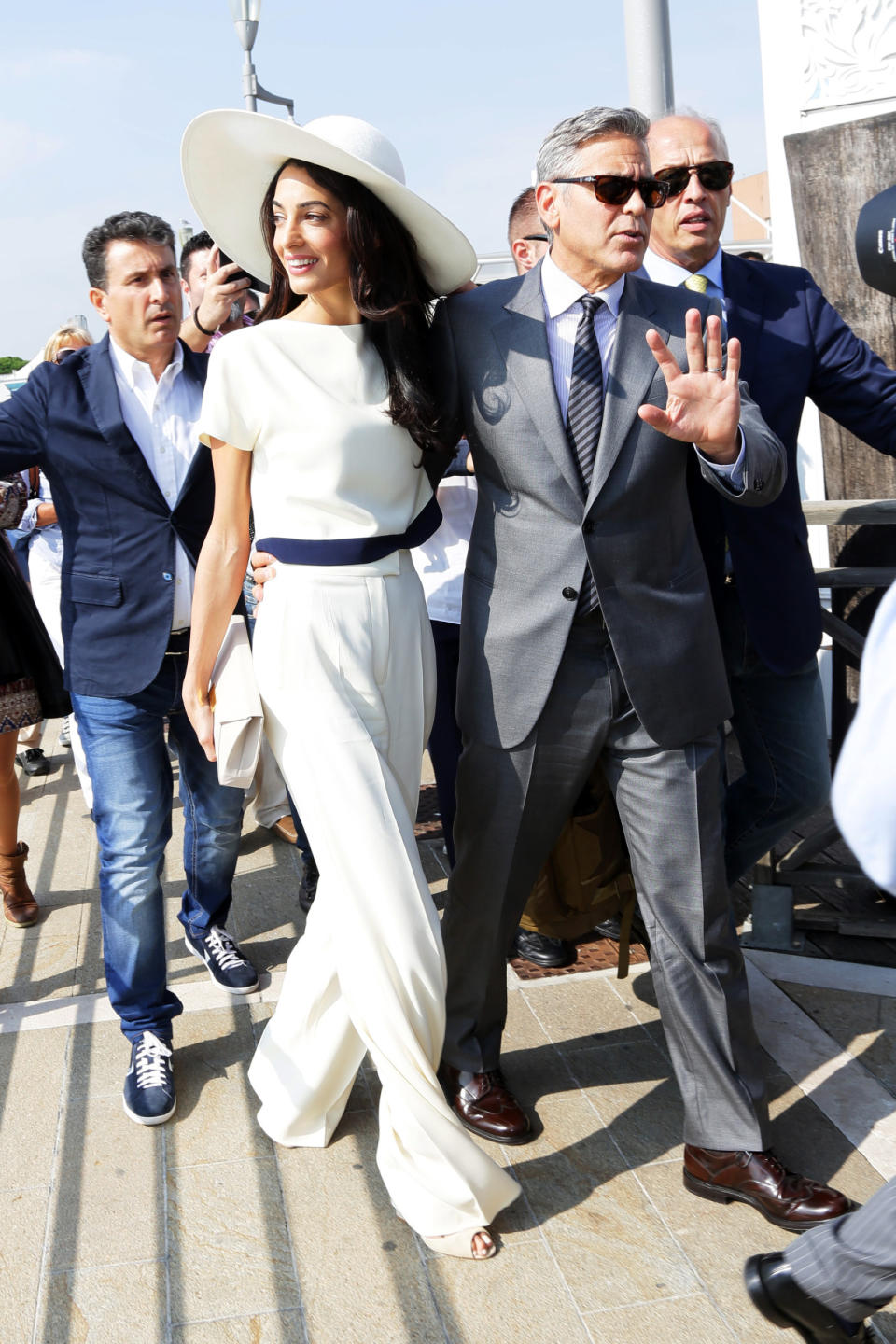 <p>During the couple’s whirlwind trip to Venice to tie the knot in September, 2014, Amal stunned in a white pantsuit. <i>(Photo by Ernesto Ruscio/GC Images)</i></p>