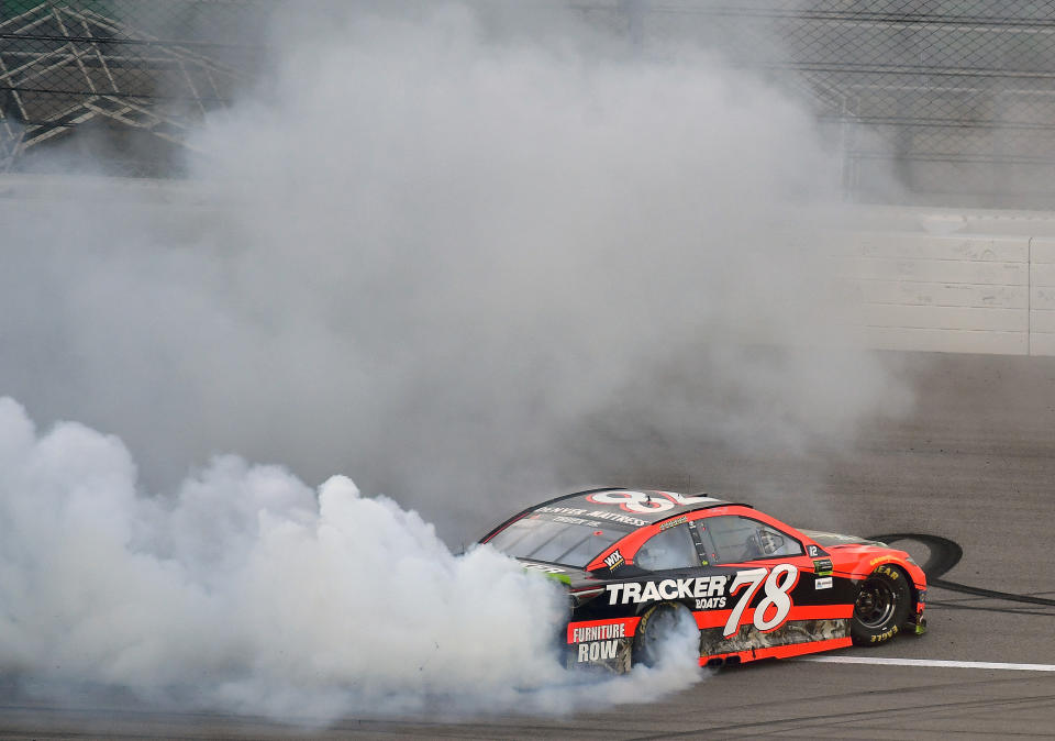 Martin Truex Jr. celebrates his seventh win of the season. (Getty)