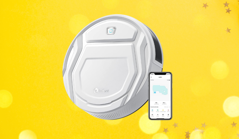 white robot vacuum and phone