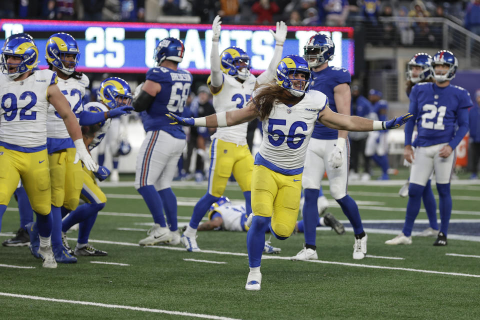 Los Angeles Rams linebacker Christian Rozeboom (56) celebrates after New York Giants place kicker Mason Crosby (21) kicks and misses a potential game-winning field goal in the final seconds of the second half an NFL football game, Sunday, Dec. 31, 2023, in East Rutherford, N.J. (AP Photo/Adam Hunger)