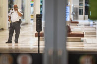Shoppers are finally allowed to leave the Mall of America after a lockdown of several hours in Bloomington, Minn., on Thursday, Aug. 4, 2022. Police in Minnesota confirm that gunshots were fired at the Mall of America in suburban Minneapolis, but say no victim has been found. (Richard Tsong-Taatarii/Star Tribune via AP)