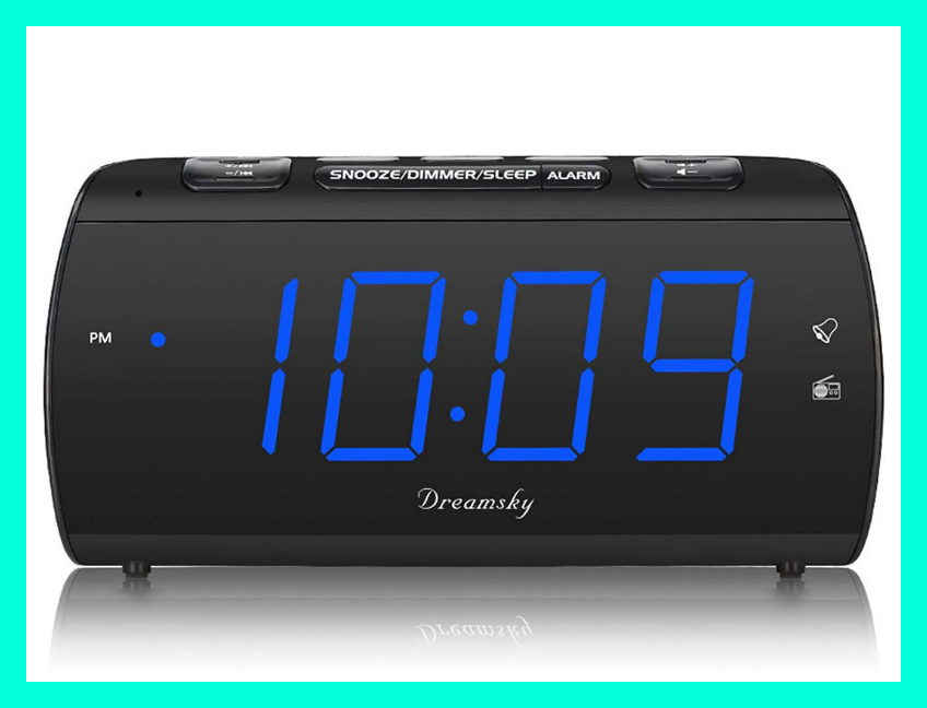 This alarm clock charges your phone as you snooze. (Photo: Amazon)