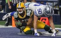 <p>Green Bay Packers’ Richard Rodgers (82) scores a first quarter touchdown in front of Sean Lee (50) in the NFL divisional playoffs on Sunday, Jan. 15, 2017 in AT&T Stadium in Arlington, Texas. (Richard W. Rodriguez/Fort Worth Star-Telegram/TNS via Getty Images) </p>
