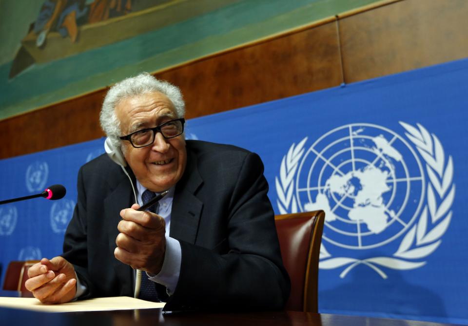 UN-Arab League envoy for Syria Brahimi gestures during a news conference at the UN in Geneva