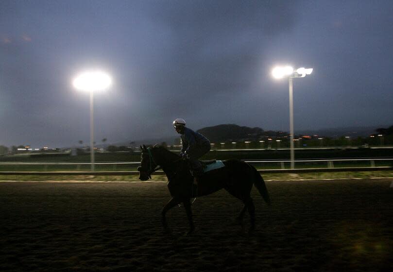 ALBANY, CA - APRIL 28: Apprentice Jockey Martin Garcia of Mexico runs a horse on the track during morning workouts at Golden Gate Fields April 28, 2006 in Albany, California. Garcia, 21, came to the United States from Veracruz, Mexico three years ago in search of work. He landed a job as a cook at a deli in Pleasanton, California. After he had been on the job for a while, Garcia found out that the restaurant owner had a horse and asked if he could ride it sometime. Garcia?s natural talent of handling the horse was noticed and he was introduced to a trainer at the local fairground racetrack. Garcia got a job working out horses and was immediately recognized for his riding abilities and asked if he would like to become a jockey. In 2005 Garcia began racing and winning. He is now the second winning jockey in the country. Despite making the average of $10,000 per week, he still works at the deli two nights a week. (Photo by Justin Sullivan/Getty Images)