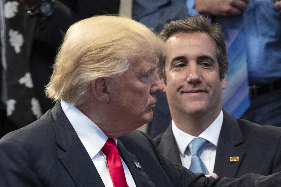 FILE- Republican presidential candidate Donald Trump, left, and attorney Michael Cohen, right, during a visit to the Pastors Leadership Conference at New Spirit Revival Center, Sept. 21, 2016, in Cleveland. Donald Trump’s fixer-turned-foe Michael Cohen returned to the witness stand Tuesday, testifying in detail how former president was linked to all aspects of a hush money scheme that prosecutors say was aimed at stifling stories that threatened his 2016 campaign. Trump is the first former U.S. president to go on trial. (AP Photo/ Evan Vucci, File)