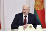 Belarusian President Alexander Lukashenko attends a meeting in Minsk, Belarus, Tuesday, Oct. 27, 2020. (Nikolai Petrov/BelTA Pool Photo via AP)