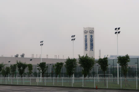 A Beijing Hyundai sign is seen at a plant of Beijing Hyundai Motor in Chongqing, China October 8, 2018. Picture taken October 8, 2018. REUTERS/Yilei Sun