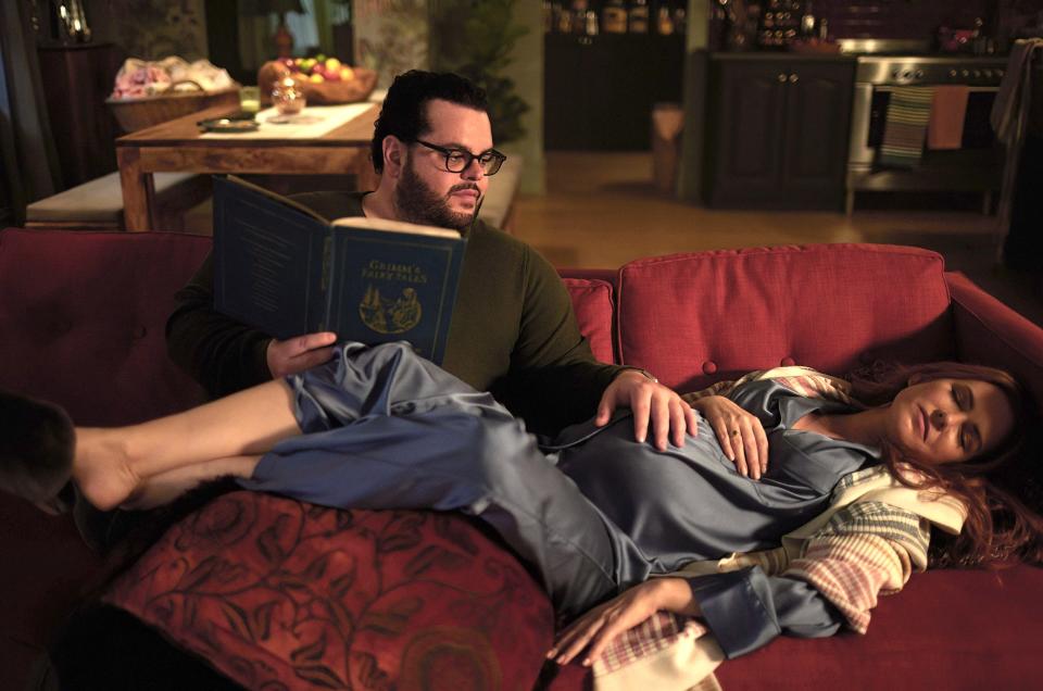 Gary (Josh Gad) cares for his pregnant werewolf girlfriend Mary (Isla Fisher) in the second season of Peacock's "Wolf Like Me."