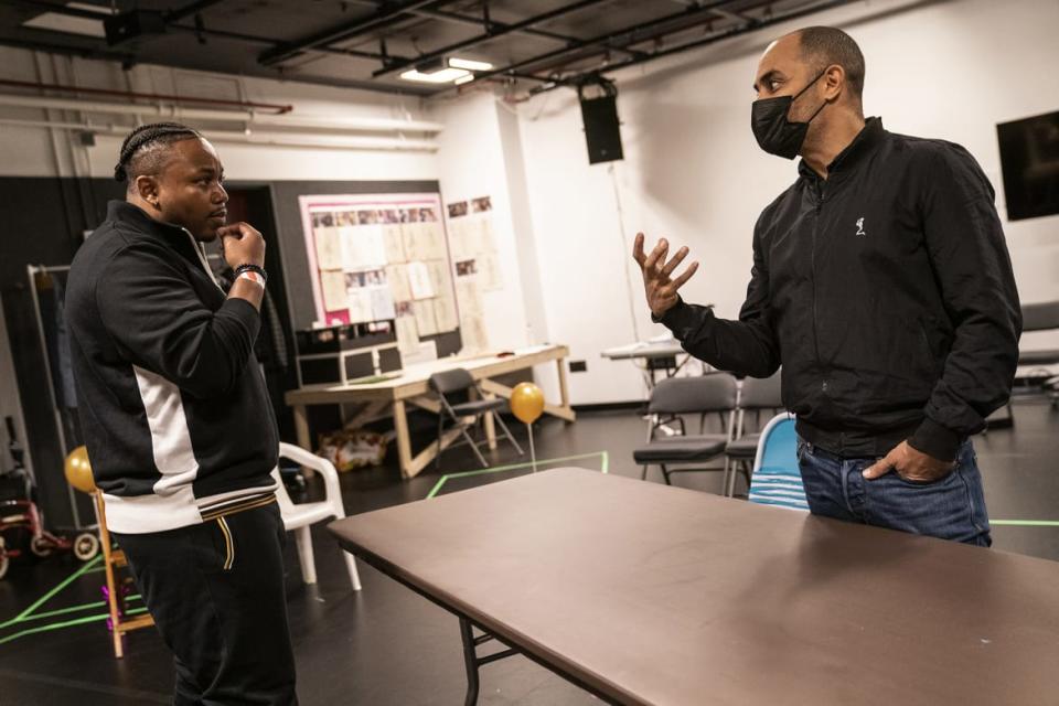 <div class="inline-image__caption"><p>Marcel Spears and director Saheem Ali in rehearsal for “Fat Ham.”</p></div> <div class="inline-image__credit">Joan Marcus</div>