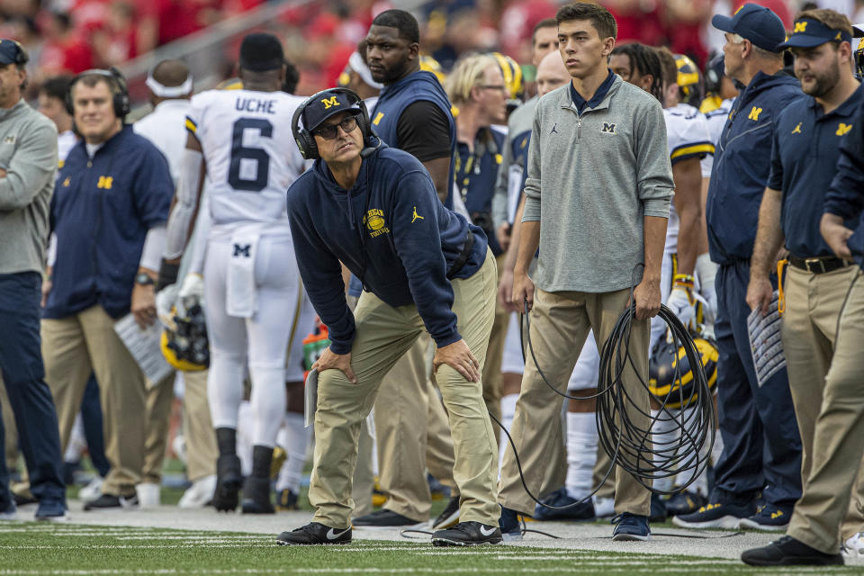 Michigan Wolverines head coach Jim Harbaugh looks on during his team's embarrassing loss to Wisconsin on Saturday. (Getty)