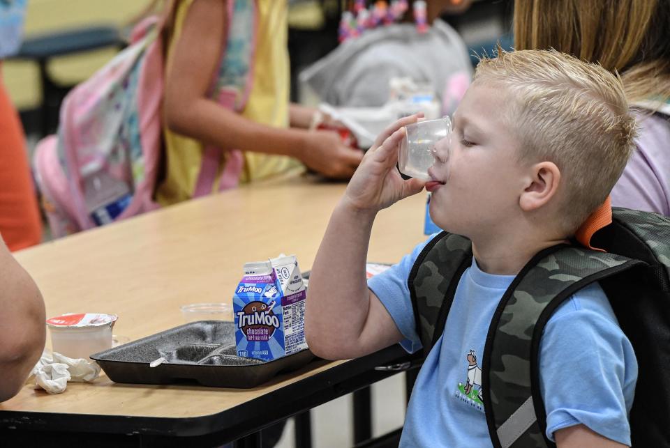 Axel Buchanan finishes his breakfast in the cafeteria before going to his kindergarten class during the first day of school at Pendleton Elementary of Anderson School District 4 Thursday, August 3, 2023.