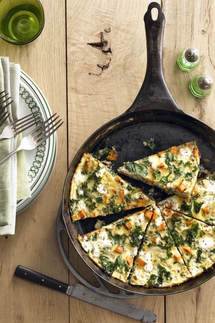 <p>One of the best things about Thanksgiving is the food, so it makes sense to start the day with something scrumptious. A fall frittata with sweet potato and kale will keep you full until the main event: turkey. </p><p><a href="https://www.goodhousekeeping.com/food-recipes/a15996/sweet-potato-kale-frittata-recipe-clx0914/" rel="nofollow noopener" target="_blank" data-ylk="slk:Get the recipe for Sweet Potato Kale Frittata »;elm:context_link;itc:0;sec:content-canvas" class="link ">Get the recipe for Sweet Potato Kale Frittata »</a> </p><p><strong>RELATED: </strong><a href="https://www.goodhousekeeping.com/holidays/thanksgiving-ideas/g29107353/thanksgiving-breakfast-ideas/" rel="nofollow noopener" target="_blank" data-ylk="slk:39 Best Thanksgiving Breakfast Ideas to Fuel Your Day;elm:context_link;itc:0;sec:content-canvas" class="link ">39 Best Thanksgiving Breakfast Ideas to Fuel Your Day</a></p>