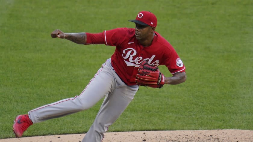 Cincinnati Reds relief pitcher Raisel Iglesias delivers during the ninth inning.