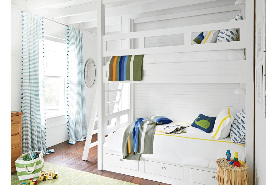 <p>Custom built-in bunk beds maximize floor space in an odd-shaped bedroom where standard twin beds wouldn't fit.</p>