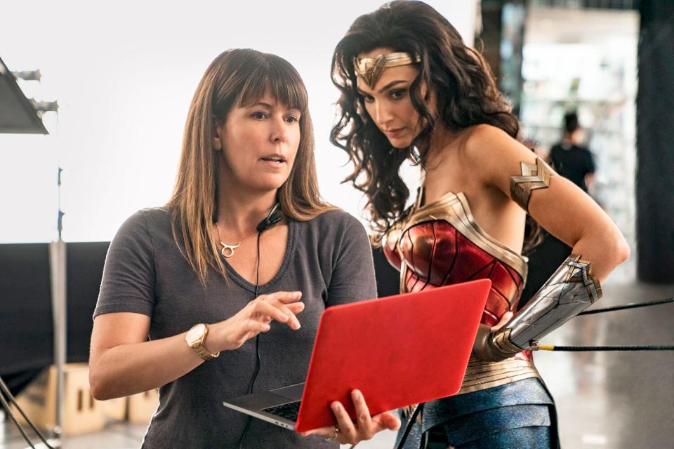 Director <a href="https://ew.com/tag/patty-jenkins/" rel="nofollow noopener" target="_blank" data-ylk="slk:Patty Jenkins;elm:context_link;itc:0;sec:content-canvas" class="link ">Patty Jenkins</a> on set with Gadot.