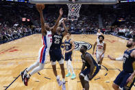 Detroit Pistons guard Jaden Ivey (23) goes to the basket against New Orleans Pelicans guard Trey Murphy III (25) in the first half of an NBA basketball game in New Orleans, Wednesday, Dec. 7, 2022. (AP Photo/Gerald Herbert)
