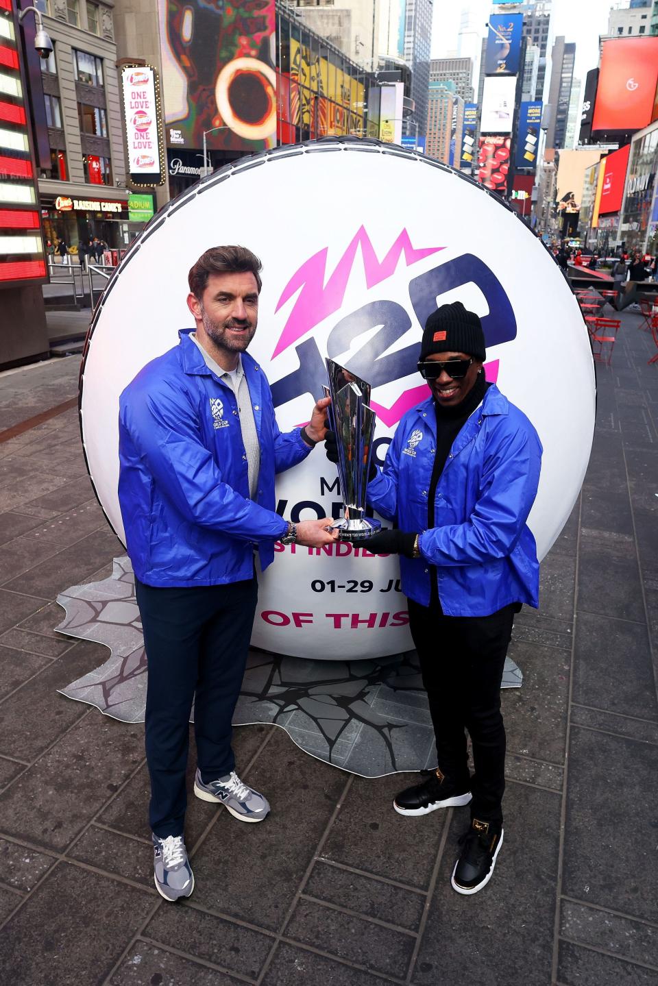 England's Liam Plunkett and former captain of the West Indies cricket team Dwayne Bravo at the '100 days to go' celebrations for the ICC Men’s T20 World Cup event in New York City on Feb. 22, 2024.