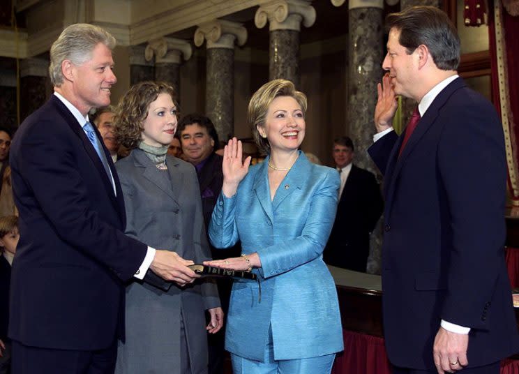 First Lady Hillary Rodham Clinton is sworn in as a Senator by Vice President Al Gore with her husband, President Bill Clinton, and daughter, Chelsea, in a reenactment ceremony in the Old Senate Chamber on Capitol Hill on January 3, 2001 in Washington, DC. (Photo STEPHEN JAFFE/AFP/Getty Images)