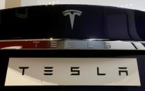 FILE PHOTO: FILE PHOTO: FILE PHOTO: A Tesla Model S vehicle is displayed at the Tesla store in Sydney, Australia
