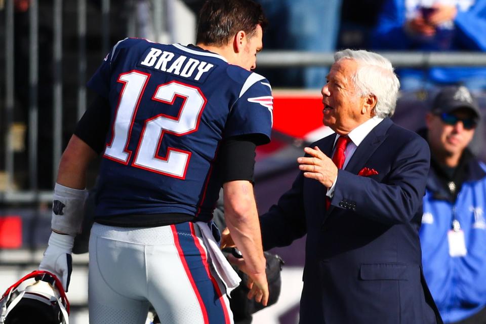 FOXBOROUGH, MA - DECEMBER 29:   Tom Brady #12 shakes the hand of owner Robert Kraft of the New England Patriots before a game against the Miami Dolphins at Gillette Stadium on December 29, 2019 in Foxborough, Massachusetts.  (Photo by Adam Glanzman/Getty Images)