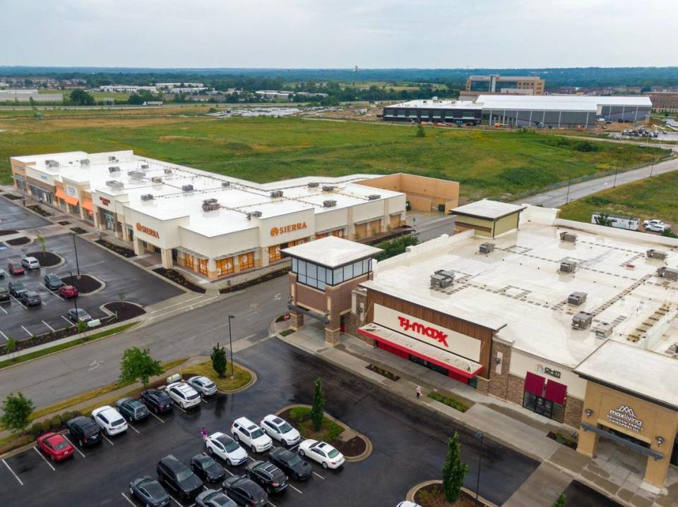 The Bluhawk development includes a shopping center, which is now mostly filled with tenants. The AdventHealth Sports Park at Bluhawk, top, a new state-of-the-art youth sports facility and family entertainment center, top, remains under construction, 7951 West 160th St., in Overland Park.The youth sports facility hopes to open in October.