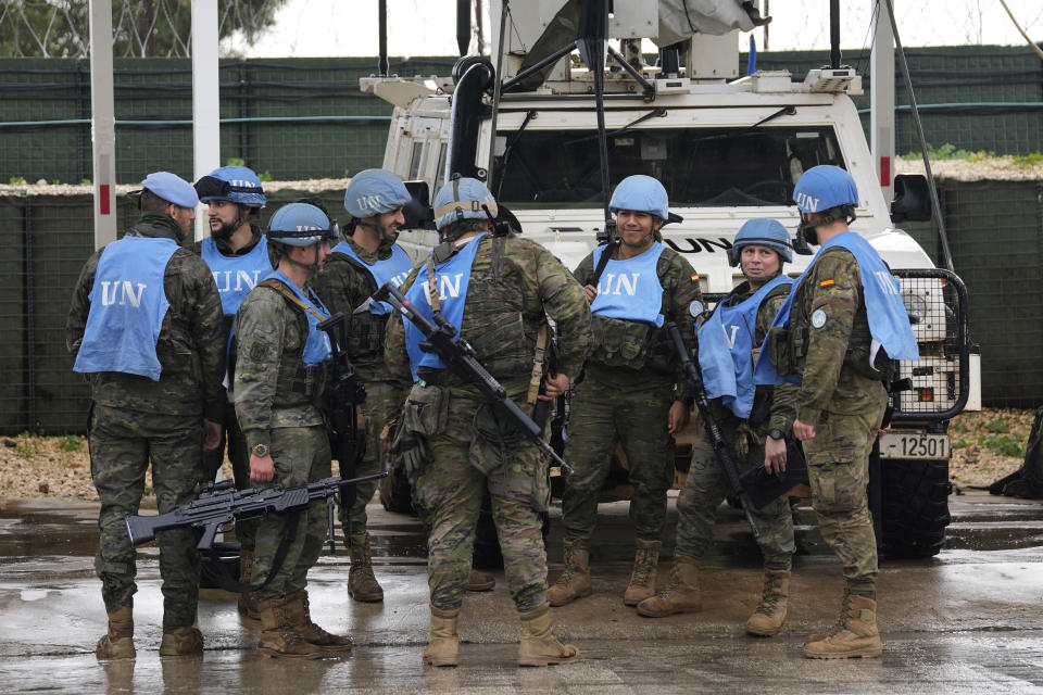 Spanish U.N. peacekeepers prepare for patrol in Abbassiyeh, a Lebanese border village with Israel, on Wednesday, Jan. 10, 2024. The prospect of a full-scale war between Israel and Lebanon’s Hezbollah militia terrifies people on both sides of the border, but some see it as an inevitable fallout from Israel’s ongoing war against Hamas in Gaza. (AP Photo/Hussein Malla)