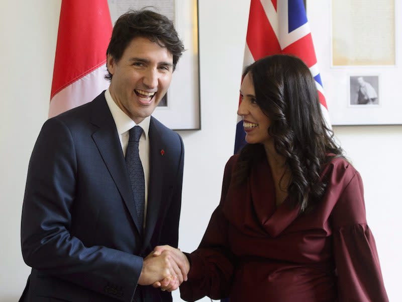 PHOTOS: Justin Trudeau meets with leaders in Lima, Paris and London
