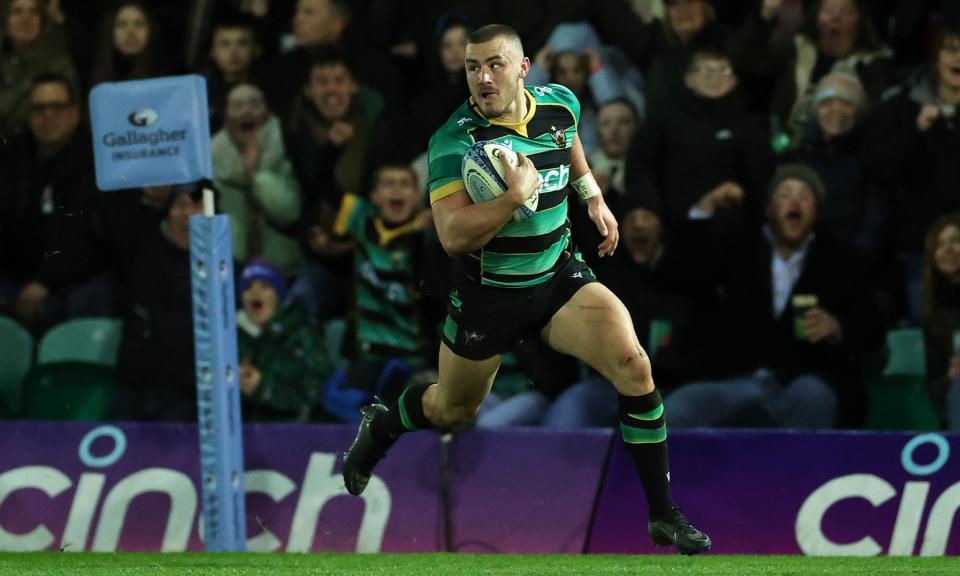 <span>Ollie Sleightholme breaks clear to score Northampton’s fifth try against Saracens.</span><span>Photograph: David Rogers/Getty Images</span>