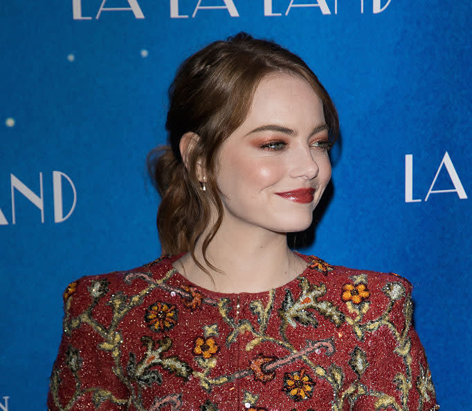 Emma Stone’s dress makes it look like she’s covered in the nighttime sky