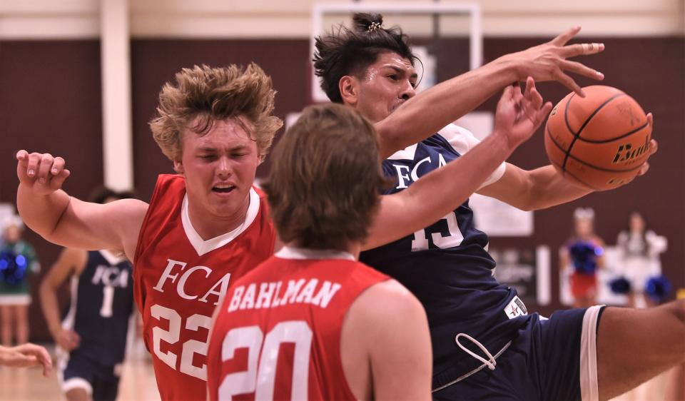 Snyder's Eber Murillo of the North team, right, battles Goldthwaite's Cason Guthrie of the South for a rebound. The South beat the North 89-73 in the Big Country FCA's All-Star Men's Basketball Game on Saturday, June 4, 2022, at Brownwood High School.