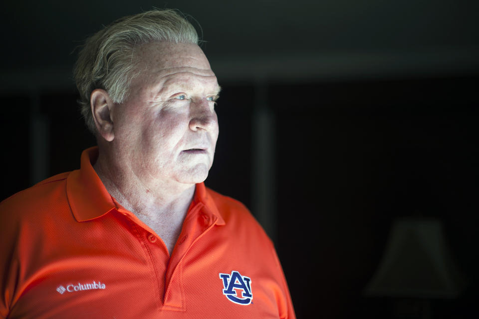 Terry Beasley poses at his home in Alabama, July 20, 2013. Beasley, a former Auburn star receiver and College Football Hall of Famer, has died of an apparent suicide, according to police. He was 73. St. Clair County Coroner Dennis Russell said Beasley was declared dead at about 5:15 p.m. Wednesday, Jan. 31, 2024. (Albert Cesare/Opelika-Auburn News via AP)