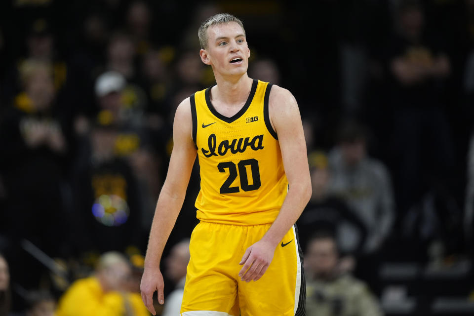 Iowa forward Payton Sandfort (20) reacts after being called for a foul during the first half of an NCAA college basketball game against Purdue, Saturday, Jan. 20, 2024, in Iowa City, Iowa. (AP Photo/Charlie Neibergall)