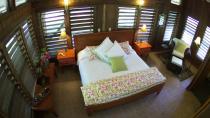 <b>NAME</b>: Chan Chich Lodge<br><b>PLACE</b>: Chan Chich, Orange Walk<br><b>PRICE</b>: CAD$175<br><br>A jungle gem in a private nature reserve, built on the site of an ancient Mayan city, the Chan Chich Lodge in Belize offers luxury accommodation and an up-close experience with wildlife.<br><br> Birders, naturalists, and adventurers are sure to fall in love with the remarkable Chan Chich Lodge in Belize. This is luxury in the jungle, where howler monkeys are your wake-up call and the first person to spot a jaguar gets bragging rights at the breakfast table. (Image courtesy of <a href="http://www.kiwicollection.com/" rel="nofollow noopener" target="_blank" data-ylk="slk:Kiwi Collection;elm:context_link;itc:0;sec:content-canvas" class="link ">Kiwi Collection</a>.)