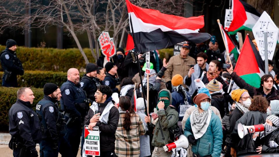 PHOTO: People gather in support of Palestinians outside of the venue where President Joe Biden is speaking to members of the United Auto Workers, in Warren, Michigan, Feb. 1, 2024.  (Jeff Kowalsky/AFP via Getty Images)