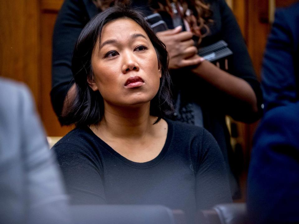 Priscilla Chan, Mark Zuckerberg's wife, sitting in courtroom looking into distance