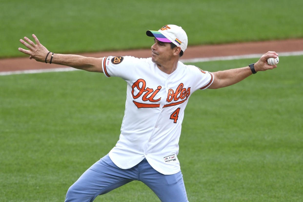 BALTIMORE, MD - JUNE 12:  Former baseball player Billy Bean throws out the first pitch before a baseball game between the Baltimore Orioles and the Toronto Blue Jays at Oriole Park at Camden Yards on June 12, 2019 in Baltimore, Maryland.  (Photo by Mitchell Layton/Getty Images)