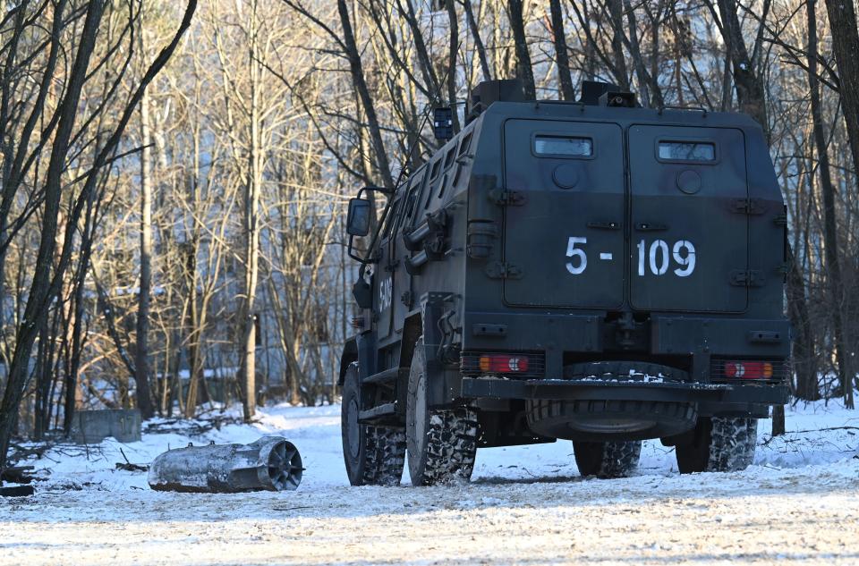 A Ukrainian armored vehicle is seen in the woods near the Chernobyl nuclear power plant.