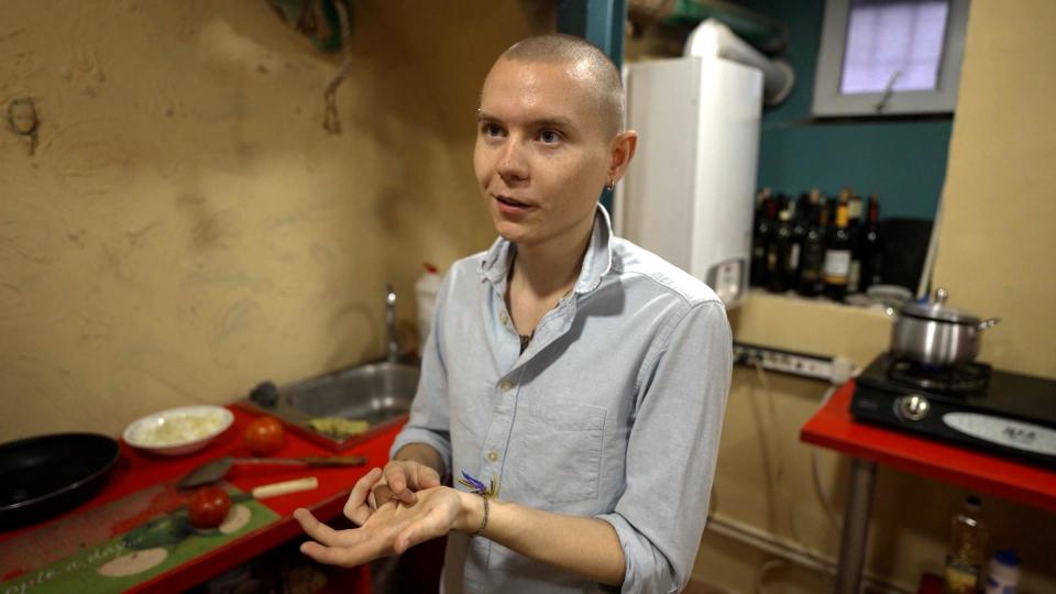 Skobar, a Russian who fled his country to avoid being sent to fight in Vladimir Putin's war in Ukraine, speaks with CBS News in the temporary shelter he shares with about a dozen other Russians in Tbilisi, Georgia.                          / Credit: CBS News