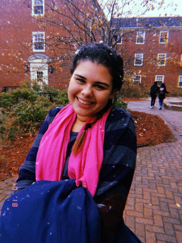 Beatriz Cordeiro works 40 hours a week on and off campus to pay for international tuition and expenses while also taking classes at St. Thomas University. (Submitted by Beatriz Cordeiro - image credit)