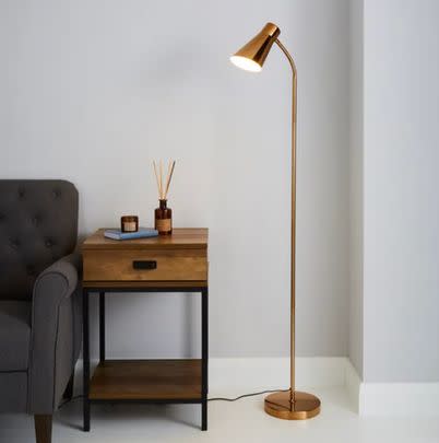 Make a 30% saving on this simple yet stylish gold floor lamp