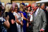 <p>Every summer, Queen Elizabeth hosts three garden parties at Buckingham Palace, and another at the Palace of Holyroodhouse in Scotland, inviting distinguished members of the public for tea on the grounds. <a href="https://www.royal.uk/garden-parties" rel="nofollow noopener" target="_blank" data-ylk="slk:The royal family;elm:context_link;itc:0;sec:content-canvas" class="link ">The royal family</a> sees these events as "an important way for The Queen to speak to a broad range of people from all walks of life, all of whom have made a positive impact in their community."</p><p>And today, the royal family's Twitter handle explained that they have been held since the mid-1800s and "are now a way of recognising and rewarding public service."</p><p>At this afternoon's party, Prince Charles is stepping in for the Queen, and mingling with the guests. His wife Camilla and his sister Princess Anne also joined him. See all the best photos from today's event right here. </p>