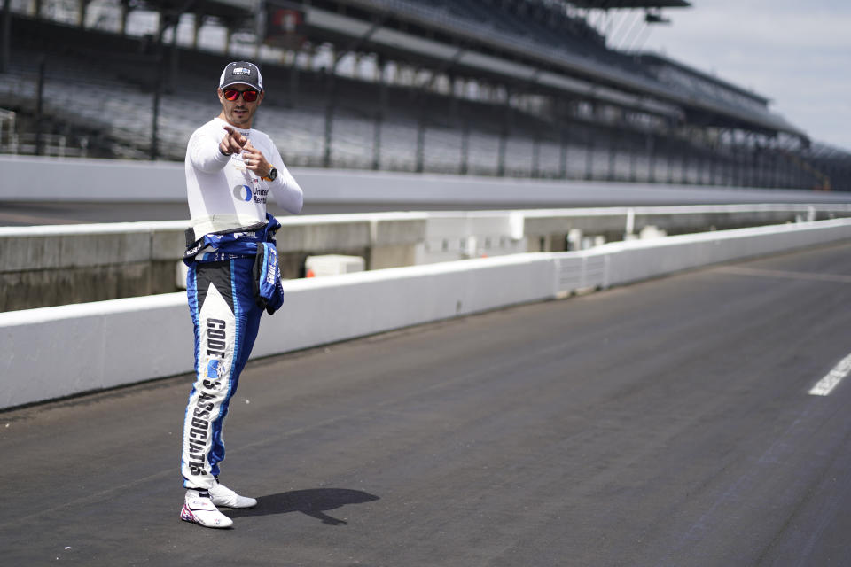 Graham Rahal looks down pit lane during testing at Indianapolis Motor Speedway, Thursday, April 21, 2022, in Indianapolis. (AP Photo/Darron Cummings)