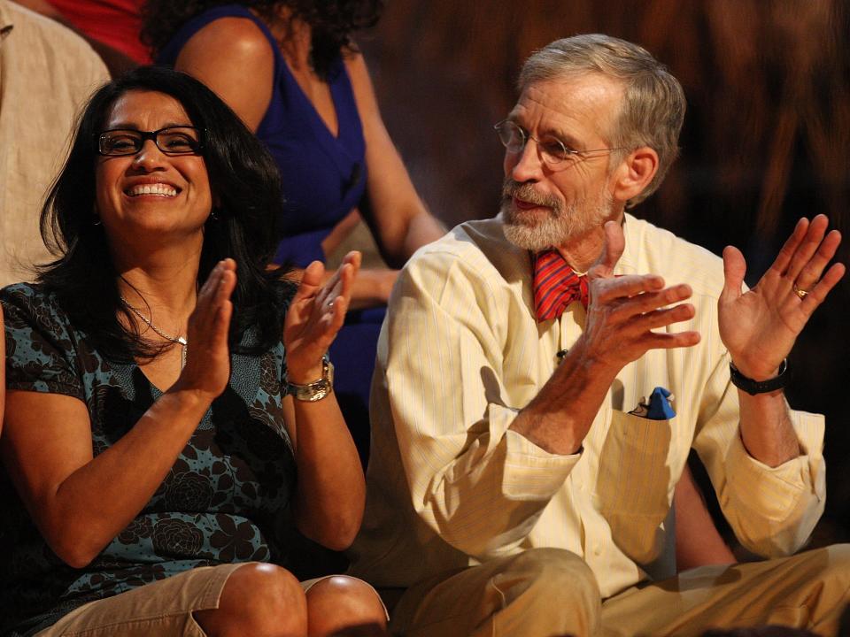 Susie Smith and Bob Crowley clapping during the Survivor reunion show