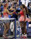 Victoria Azarenka of Belarus (L) congratulates Serena Williams of the U.S.on her victory in their women's singles final match at the U.S. Open tennis championships in New York September 8, 2013. REUTERS/Mike Segar (UNITED STATES - Tags: SPORT TENNIS)